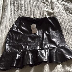Black leather mini skirt